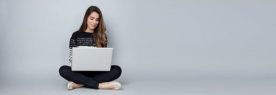 body-girl-sitting-on-floor-with-laptop