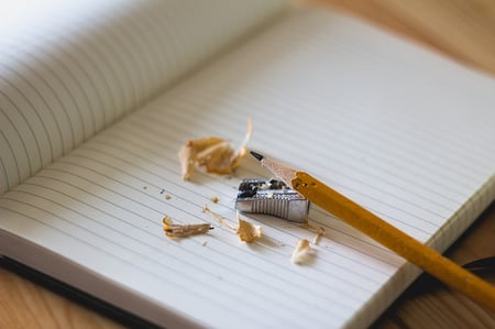 write down hypothesis body-pencil-notebook-writing