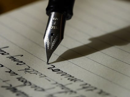 body_pen_paper_writing_cursive