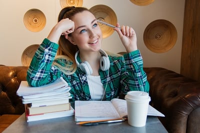body_student_smiling_studying_books