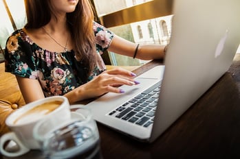 write a university essay body_woman_laptop_coffee-1