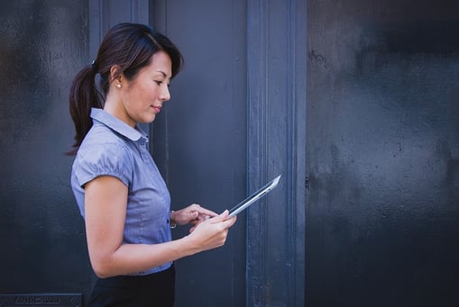 feature-woman-holding-ipad-1